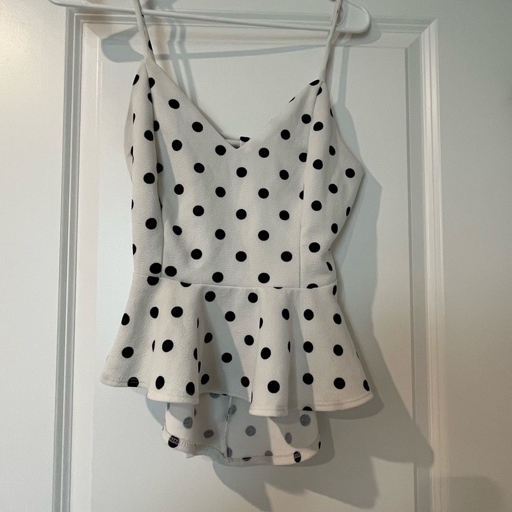 Charlotte Ruse polka dot peplum shirt. Size Medium.